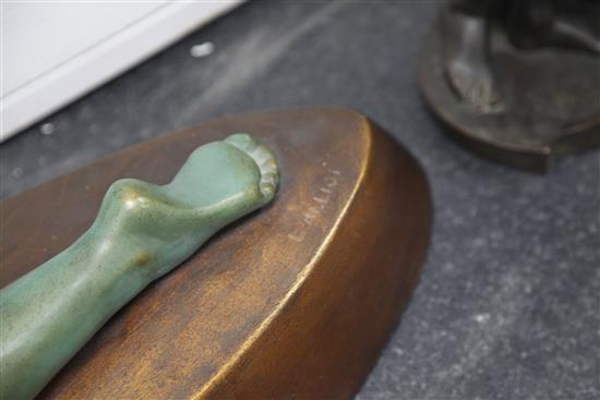 A French Art Deco painted terracotta model of a female nude dancer, 28in.